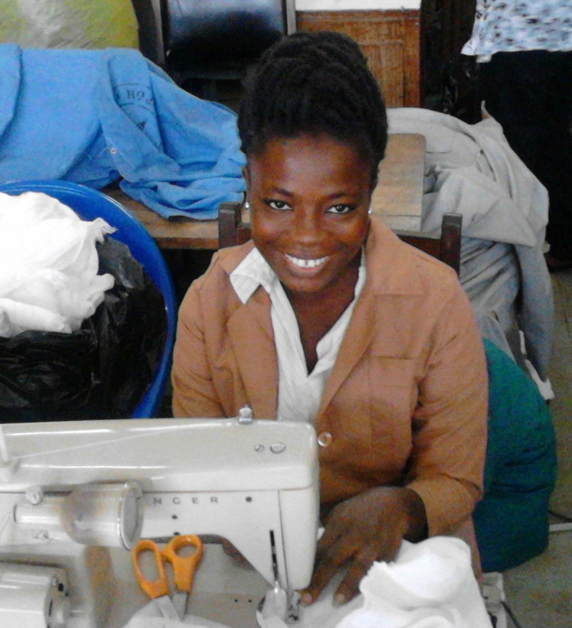 Zidisha  To help buy thread & material for sewing business